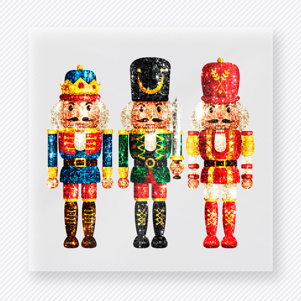 Christmas Nutcracker Trio Christmas DTF transfer featuring three bright colorful Christmas nutcrackers