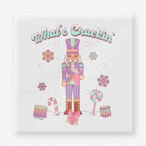 What's Crackin Nutcracker Christmas DTF transfer featuring pastel nutcracker with What's Crackin text and candy accents