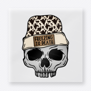 Freezing to Death Cow Print Skull Christmas DTF transfer with a skull in sunglasses wearing a cow-print freezing to death beanie