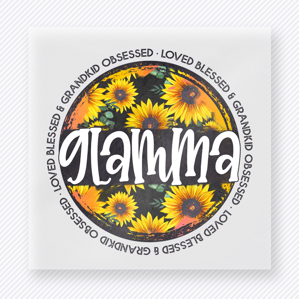 Loved Blessed and Grandkid Obsessed Glamma family DTF transfer design featuring a sunflower-filled round badge with large GLAMMA lettering and the phrase Loved, Blessed and Grandkid Obsessed around the border