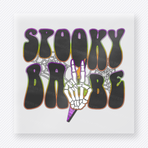 Spooky Babe Halloween DTF transfer with bold black and purple letters and skeleton hand accent