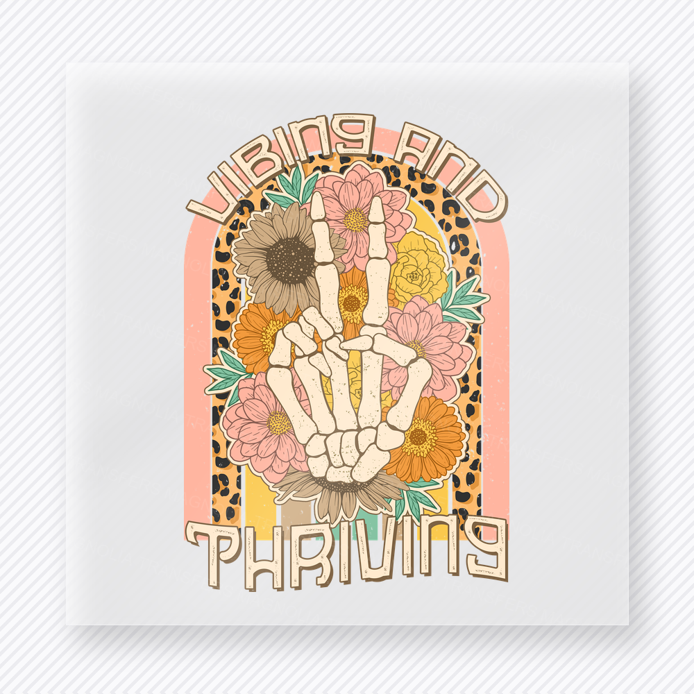 Living And Thriving Neutral Skeleton motivational DTF transfer mockup with peace-sign skeleton hand with sunflower and neutral arch