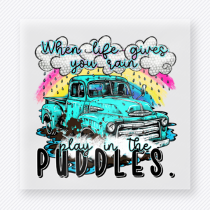 When Life Gives You Rain Play In The Puddles motivational DTF transfer mockup with blue truck, rainbow, and colorful splatter
