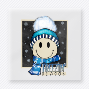Freezin Season Blue Smiley Winter DTF transfer featuring smiley face artwork with blue winter hat, scarf, snowflakes, and Freezin Season text